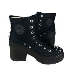 One pair of new without box unisex adult Converse Chuck 70 De Luxe Heel Hi Studded Boot (A08103C). The color is black, and the size is woemn's US 10 (fits men's US 8) (UK 8, EUR 41.5, CM 26.5). Specifications: High heel  Studded accents High top Canvas material upper Converse Chuck Taylor All Star logo on inner ankle and back heel  Shipping: We ship all items within 24 hours excluding weekends and federally recognized holidays. Returns: We accept domestic returns for this item within 30 days. New items returned in used condition will not be accepted. Questions? Feel free to message us. We will return your message promptly. Looking for more discounted brand names? Shop our store! Heels Converse, Chuck 70 De Luxe Heel, Converse Heels, Converse Platform, Rockstar Aesthetic, New Converse, Converse Chuck 70, Studded Boots, Star Logo