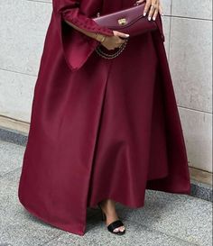 Soft satin crimson coat style red Abaya with classical cut design with elegant buttons Perfect choice for daily outings or family gatherings.FREE HIJAB INCLUDED Red Abaya, Abaya Inspiration, Elegant Abayas, Abaya Outfit, Modest Casual Outfits, Brand Photography Inspiration, Ladies Blouse Designs, Party Fits, Elegant Dresses Classy