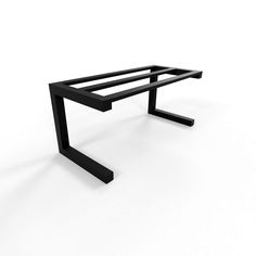 a black table that is on a white surface with one leg bent down to the side