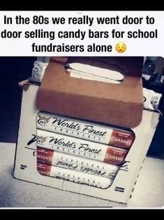 a cardboard box with some candy bars in it and the caption reads, in the 80's we really went door to door selling candy bars for school fundraisers alone