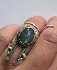 This Labradorite Queen is for the queen!! I adore this ring... finally time to let it go! A stunning rose cut super Blu flash Labradorite stone is held within a simple bezel with rope border. This setting sits atop a chunky band with angular details. Ring band has rope border as well as fine silver ball details at the top.  I have oxidized and polished this beauty up to showcase the gorgeous Labradorite. Handmade from scratch & ready to ship! Xo  *Size 6* *Please feel free to ask me additional q Silver Ring Chunky, Silver Smithing Jewelry, Simple Ring Design, Silversmith Rings, Jewelry Closet, Rope Border, Armor Ring, Silversmith Jewellery, Funky Jewelry