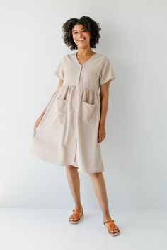 'Adana' V-Neck Button Down Corduroy Midi Dress in Beige V-neck Midi Dress With Pockets For Daywear, Beige V-neck Midi Dress With Pockets, Corduroy Dresses For Spring, Cotton V-neck Midi Dress With Button Closure, Spring V-neck Knee-length Dress With Buttons, Casual Beige Midi V-neck Dress, Casual Beige V-neck Midi Dress, Casual Knee-length Corduroy Dress, Casual Corduroy Dresses With Button Closure