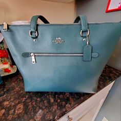 This Is An Absolutely Beautiful Bag! I Bought It, And It's Just Been Sitting In My Closet Now Never Been Used. Still Has The Tags And Padding. New With Tags. Store Price Was: $330 When I Bought It On-Sale. Great Bag With A Lot Of Room! Coach Tote, Dark Turquoise, Beautiful Bags, Womens Tote Bags, Coach Bags, Turquoise, Tags, Closet, Women Shopping