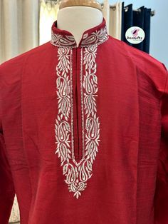 Product Description This full sleeve kurta features high-grade material with intricate embroidery details at the collar neck and placket. Short Kurta for both formal and informal use with jeans & trouser Ready to wear kurta for Man Kurta : Rose Red shade with golden embroidery on neck Pocket : Yes Fabric : Cotton Silk Actual color of the dress may slightly vary due to the screen resolution. Refer the size chart for measurements Design: SK- 1081 Red Resham Embroidered Kurta For Transitional Season, Red Kurta With Resham Embroidery For Transitional Season, Red Silk Churidar For Transitional Season, Transitional Red Silk Churidar, Transitional Red Raw Silk Kurta, Red Silk Kurta With Resham Embroidery, Transitional Silk Kurta With Embroidered Border, Traditional Wear For Festivals With Long Sleeve, Festive Traditional Wear With Long Sleeves