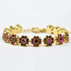 Fancy Flower Crystal Bracelet - Goldmakers Fine Jewelry Formal Adjustable Ruby Bracelets, Adjustable Ruby Bracelets For Formal Occasions, Adjustable Ruby Bracelet For Formal Occasions, Gold Ruby Bracelets For Party, Gold Ruby Bracelet For Party, Elegant Red Adjustable Crystal Bracelet, Elegant Adjustable Red Crystal Bracelet, Gold Crystal Bracelet With Jewels, Adjustable, Adjustable Gold Crystal Bracelet With Jewels