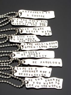 five silver tags with words on them that say, happiness is a choice if you obey all miss all the peace i love you to the moon and back