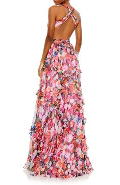 Romantic ruffles and blooming roses come together for runway-ready drama in this halter-style gown detailed with daring waist cutouts and an open back. 63" length Plunge neck Lined 100% polyester Spot clean Imported Asian Owned/Founded Cutout Gown, Mac Duggal Dresses, Exude Confidence, Pure Elegance, Chiffon Floral, Sleeveless Gown, Floral Gown, Floral Print Chiffon, Pleated Bodice