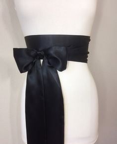 "Solid Black Sash Black Satin Sash Reversible Double Waist Wrap Belt Scarf Belt Obi Sash, Bow Belt Bridesmaid Wedding Sash Satin Swank Make this Satin Swank® reversible waist sash the perfect finishing touch for your wedding, bridesmaid, or special occasion dress, or just the right piece to add instant polish to your dress or top. This extra long version is 3.5 inches wide, 120 inches long, and will wrap around most waist sizes two times with a generous length remaining to tie in a bow or a simp Fitted Satin Bow Sash For Party, Elegant Satin Sash With Tie Back, Fitted Sashes With Satin Bow, Elegant Fitted Sashes With Tie Back, Elegant Fitted Sash With Tie Back, Satin Bridal Belt For Party, Fitted Bow Sash For Bridesmaid, Elegant Black Sash For Evening, Fitted Bridesmaid Sash With Bow