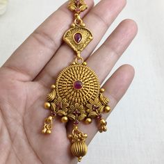 Fine Quality Gold-plated Maang Tikka is an antique Indian bridal jewelry piece, inspired by temple jewelry. Perfect for weddings, this forehead accessory is ideal for Pakistani bridal looks. Its traditional design and intricate craftsmanship make it a timeless gift for her, adding elegance to any special occasion. *𝐏𝐑𝐎𝐃𝐔𝐂𝐓 𝐃𝐄𝐓𝐀𝐈𝐋* * Material: Brass * Plating: Gold Plated *𝐃𝐈𝐌𝐄𝐍𝐒𝐈𝐎𝐍𝐒* *    Weight 18 gm Each, Length 2.2 Inches, Width 1.5 Inches, Top Chain Length: 2.6 Inches Antique Yellow Gold Jewelry For Puja, Temple Jewelry Tikka With Intricate Design As Gift, Antique Gold Temple Necklace For Wedding, Antique Jewelry For Diwali Puja, Gold Cutdana Temple Jewelry Tikka, Gold Temple Jewelry Tikka As Gift, 22k Gold Meenakari Temple Necklace For Rituals, Gold Temple Jewelry Tikka With Cutdana, Gold Cutdana Tikka Temple Jewelry