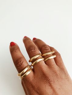 A simple yet beautiful, lightly textured, double sculpted adjustable ring. Pairs perfectly with any of our rings and bracelets. DETAILS: Solid Brass Adjustable Ring Ships with polishing cloth to keep it forever shining. Packaged for gift giving. *Sold individually, not a set. Return to shop: Afrohemien.etsy.com Like and Follow Afrohemien for updates, sales, coupons and surprise giveaways Instagram/Blog: instagram.com/Afrohemien Tumblr: Afrohemien.tumblr.com Facebook: www.facebook.com/Afrohemien Adjustable Thick Band Dome Ring For Everyday, Adjustable Dome Ring With Thick Band For Everyday, Adjustable Stackable Wide Band Ring For Everyday, Adjustable Open Dome Ring For Everyday Wear, Adjustable Open Dome Ring For Everyday, Everyday Brass Open Ring Jewelry, Adjustable Gold Wide Band Ring For Everyday, Hand Forged Open Ring For Everyday Wear, Everyday Brass Open Ring