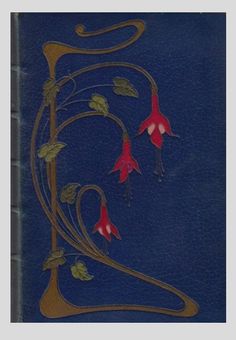 a blue book cover with red flowers and vines on it's side, in the shape of a letter z