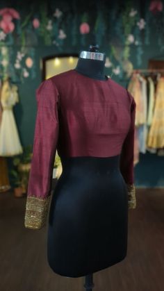 Maroon rawsilk blouse with antique gold hand embroidery Sleeves: full sleeves with embroidery  Neck : front and back t shirt neck  Size: please choose a standard size from the drop down. If you need custom measurements I'll send a detailed measurements chart. Customisation is possible. Please message or leave notes with any personalization. Gold Long Sleeve Slub Silk Kurta, Traditional Cotton Silk Wear With Zari Work, Unstitched Slub Silk Blouse Piece For Party, Chanderi Kurta With Gold Embroidery For Reception, Cotton Silk Traditional Wear With Dabka Work, Festive Embroidered Top For Reception With Traditional Drape, Festive Embroidered Top For Reception, Gold Kurta With Dori Work For Reception, Long Sleeve Kurta With Dori Work For Reception