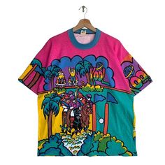 Check out this item in my Etsy shop https://www.etsy.com/listing/1439160119/vintage-planet-kool-polo-team-all-over Oversized Printed Multicolor T-shirt, Oversized Multicolor Top For Streetwear, Oversized Multicolor Graphic Print T-shirt, Multicolor Relaxed Fit T-shirt With Graffiti Print, Multicolor Cotton Tops With Graffiti Print, Oversized Multicolor Screen Print T-shirt, Multicolor Relaxed Fit Tops For Streetwear, Graphic Tee Multicolor Tops For Streetwear, Oversized Multicolor Printed T-shirt