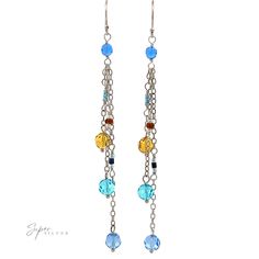 Blue and yellow multi-beaded dangle earrings Materials: .925 Sterling Silver, Multicolored Beads Dimensions: 93mm length Multicolor Dangling Beads Jewelry Made Of Czech Glass, Multicolor Czech Glass Jewelry With Dangling Beads, Multicolor Long Drop Beaded Jewelry, Multicolor Dangle Crystal Earrings With Ear Wire, Multicolor Crystal Dangle Earrings, Colorful Beaded Earrings In Sterling Silver, Multicolor Crystal Dangle Earrings With Colorful Beads, Colorful Round Beaded Sterling Silver Earrings, Colorful Sterling Silver Beaded Earrings