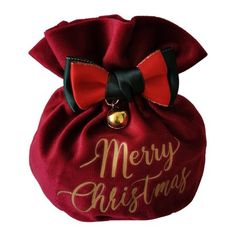 a red bag with a bow and merry christmas written on it