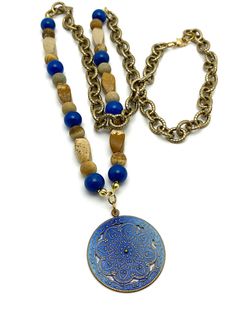 This stunning Blue Coin Necklace radiates boho chic! Crafted with a blue coin pendant and dangling jade and jasper beads, it hangs gracefully from a gold rope chain. Make a statement and turn heads with this one-of-a-kind necklace! Necklace measures 33 inches in length, but can also be worn as a double wrap choker. Boho Style Necklaces, Blue Jade, Gold Rope Chains, Blue Pendant, Jasper Beads, Jade Beads, Coin Necklace, Coin Pendant, Rope Chain