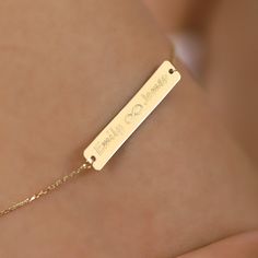 D E S C R I P T I O N Make every moment special with our 14K Solid Gold Engraved Bar Personalized Bracelet, a heartfelt and timeless piece that speaks volumes. Surprise your loved ones with this exquisite bracelet, crafted with precision and personalized just for them. The delicate bar design, available in Yellow gold, Rose gold, or White gold, allows you to add a name, date, or special message, making it a cherished keepsake that complements any style. P R O D U C T ∙ F E A T U R E S * Gold mat Elegant White Gold Name Bracelet With Engraving Option, 14k White Gold Promise Bracelets, White Gold 14k Promise Bracelets, White Gold 14k Promise Bracelet, Elegant Sterling Silver Name Bracelet With Engraving Option, 14k Gold Name Bracelet With Engraving For Anniversary, Fine Jewelry Engraved Bracelets For Anniversary, Elegant Promise Jewelry With Engraving Option, Anniversary Yellow Gold Bracelet With Engraving Option