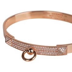 Guaranteed authentic Hermes Diamond Collier de Chien bracelet featured in 18k Rose Gold.Set with 130 Diamonds.Total carat weight is .91Chic and instantly recognizable.Bracelet has signature stamps inside. Comes with signature brown pouch and signature Hermes gift box.NEW or NEVER WORN. final saleSIZE SBRACELET MEASURES:WIDTH 1cmCIRCUMFERENCE 6.2" CONDITION:NEW or NEVER WORN PLEASE NOTE: This Hermes bracelet requires bank wire transfer, Bitcoin or USDT for payment unless arrangements are made pri Hermes Gift, Hermes Bracelet, Signature Stamp, Gold Set, 18k Rose Gold, Gold Bracelet, Gift Box, Bangles, Diamonds