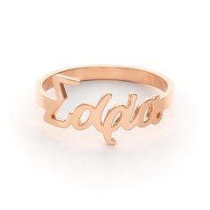 Every proud Greek needs a Greek name ring in her jewelry box. Customize it with your name, or choose your favorite Greek word to create a ring that is uniquely yours. Guaranteed to garner compliments, you'll want to wear this Greek name ring every day. Personalized Engraved Rose Gold Ring, Customizable 14k Gold Jewelry For Promise, Customizable 14k Gold Promise Jewelry, Personalized 14k Gold Initial Ring For Promise, Custom Name Engraved Ring In Rose Gold For Promise, Custom Name Engraved Rose Gold Ring For Promise, Customizable Rose Gold Promise Rings, Custom Name Engraved Rose Gold Promise Ring, Custom Name Initial Ring In 14k Gold For Promise