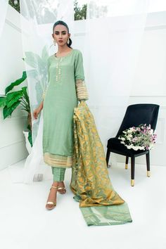 Embroidered Slub Silk Palazzo Set For Navratri, Embroidered Slub Silk Palazzo Set, Green Slub Silk Traditional Wear With Resham Embroidery, Embroidered Slub Silk Palazzo Set With Traditional Drape, Designer Raw Silk Palazzo Set With Dori Work, Eid Slub Silk Palazzo Set With Resham Embroidery, Eid Chanderi Palazzo Set With Gota Work, Traditional Slub Silk Churidar With Dabka Work, Semi-stitched Silk Kurta With Gota Work