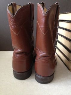 "Vintage Justin Roper Cognac Leather Western Riding Biker Boots Size 9.5 D Mens Made in USA Thick & sturdy leather, leather sole, wood stacked heels Length is 11.75\", width is 4\", Height is 10.75\", 1\" soles, insoles 11\", boots are marked as 9.5 D please check chart below for sizing questions, and measure well before purchasing, thank you http://www.zappos.com/c/shoe-size-conversion Leather is in good condition, with scuffing & marks, scratches on the toes, wood heels show age. Soles Brown Goodyear Welted Work Boots For Ranch, Brown Steel Toe Boots For Ranch, Brown Moc Toe Work Boots For Ranch, Classic Brown Work Boots For Fall, Western Brown Work Boots With Goodyear Welt, Brown Western Work Boots With Goodyear Welt, Brown Western Work Boots Goodyear Welted, Western Brown Work Boots With Plain Toe, Brown Snip Toe Moto Boots For Riding