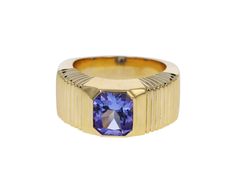 Striking in its intense color and modern design, this Retrouvai ring has a breathtaking presence. The rectangular blue-lavender tanzanite is set vertically and bezel set within the tiered 14K yellow gold polished band. Wear it as a statement making alternative to the traditional cocktail ring. It is a modern classic. tanzanite : 7.5mm x 7mm : 2.41ct14K yellow gold band width : 5mm to 9mmsize available : 6.5please contact us for sizing options Modern Yellow Gold Sapphire Ring For Formal Events, Modern Yellow Gold Sapphire Ring For Formal Occasions, Gold Rectangular Amethyst Ring For Formal Occasions, Formal Yellow Gold Tanzanite Rings, Modern Emerald Cut Amethyst Ring, Fine Jewelry Rectangular Tanzanite, Rectangular Tanzanite Jewelry For Anniversary, Modern Tanzanite Gemstone Ring, Rectangular Sapphire Ring For Formal Occasions