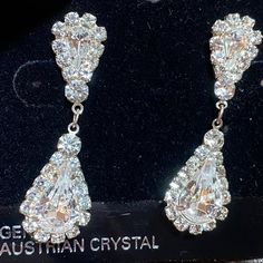 Austrian Crystal Teardrop Silver Earrings From Nordstrom Large Crystals Statement Earrings Genuine Austrian Crystals- Spectacular!! Hanging Teardrop Chandelier Design Silver Tone For Pierced Ears These Capture The Light, They're So Rich Looking. Good Weight That Anyone Can Wear. Stunning Earrings On! Only Pair. Dazzling Drop Crystal Earrings For Formal Occasions, Formal Dazzling Drop Crystal Earrings, Classic Drop Crystal Earrings For Party, Classic Crystal Teardrop Earrings For Party, Classic Teardrop Crystal Earrings For Parties, Formal Teardrop Crown Crystal Jewelry, Nordstrom Gold Jewelry For Formal Occasions, Nordstrom Gold Formal Jewelry, Nordstrom Elegant Gold Jewelry