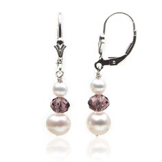 Great earrings for a special night out. Soft pink Swarovski crystals pair beautifully with our smooth freshwater pearls creating a dreamy and enchanted look. Impress your Prince Charming with these stunning earrings and the perfect dress.Pearl Type: Freshwater Cultured PearlPearl Shape: RoundPearl Color: Natural WhitePearl Luster: HighPearl Uniformity: ExcellentPearl Size: 4 and 7 mmSemi-precious: Swarovski CrystalsLever-back: Sterling SilverDrop 1 inch Earrings handmade in Chicago by I Do Pearl Drop Earrings Simple, Pink Crystal Earrings, Dress Pearl, Crystals Earrings, Gold Jewelry Gift, Beaded Earrings Diy, Pearl Dangle Earrings, Pink Swarovski, Earrings Inspiration