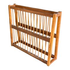 a wooden rack with three compartments on each side