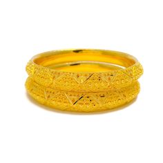 This pair of bangles is crafted from 22k gold, weighing a substantial 57.1 grams, and features a stunning yellow gold finish. Each bangle is sized at 2.8 inches with a 2.5-inch diameter, showcasing bold striped detailing that offers a look of extravagance and striking elegance. These bangles are not openable, which enhances their sleek and seamless silhouette. Ideal for those seeking to make a powerful fashion statement, this pair adds a touch of opulence and style to any ensemble, perfect for s Yellow 22k Gold Bracelet For Festive Occasions, Yellow 22k Gold Festive Bracelet, Festive 22k Gold Yellow Bracelets, Festive 22k Gold Bangle, Festive Yellow Gold Round Bangle, Festive Yellow Gold Bangle, Festive Yellow 22k Gold Bracelet, Traditional Yellow Gold-plated Bangle, Traditional Yellow Gold Plated Bangle