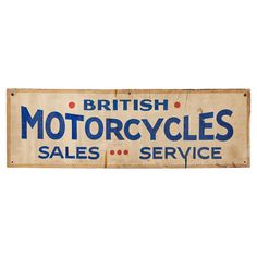 an old british motorcycle sales sign