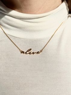 Introducing the "Alive" Necklace - a powerful reminder that echoes the resilience and triumph of every survivor, fighter, and thriver. This exquisite piece encapsulates the essence of life itself, serving as a constant affirmation that, regardless of the battles faced, you are still alive today. With its elegant design and captivating presence, this necklace becomes a cherished symbol of strength, courage, and the indomitable spirit that resides within. Wear it proudly as a testament to your jou Everyday Gold Butterfly Necklace, Gold Butterflies Necklace, Gold Butterfly Pendant Necklace, Elegant Personalized Butterfly Necklace, Gold Metal Butterfly Necklace, Word Necklace, Life Itself, Symbols Of Strength, Adventure Style