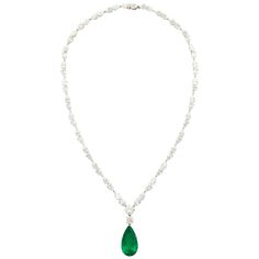 The platinum and diamond necklace features 59 diamonds (58 pear shape and 1 round) weighing a total of 32.23cts. The pendant is comprised of a pear shape Colombian emerald weighing 15.69cts with a Gübelin certificate and a 1.01cts round diamond (GIA certificate F VS1). The necklace can be worn either with, or without, the detachable pendant. Made in New York. Diamond And Emerald Necklace, Emerald Diamond Pendant, Family Closet, Detachable Pendant, Ruby And Diamond Necklace, Drop Necklaces, Jewelry Wishlist, Emerald Diamond Earrings, Noble Lady