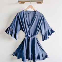 These luxurious robes are perfect for the whole bridal party to wear while getting ready! They make a lovely gift for bridesmaids, or an engagement or bridal shower gift for the bride to be. Choose from nine different colors to match your wedding scheme perfectly. Satin chiffon with matte finish, ruffled trim, and a waist tie. Adult:Fits Most size (S - L) / 40" Bust, 37" LengthPlus size (XL - XXL) / 50" Bust, 40" Length Kids:Size 4 / 25" bust, 24" LengthSize 8 / 27"Bust, 28" Length Personalized Bridal Shower Gifts, Gift For Bridesmaids, Gift For The Bride, Custom Gift Boxes, Bridesmaid Robes, Bridal Shower Gift, Bridal Robes, Morning Wedding, Bride To Be