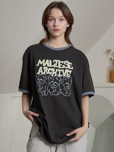 This is a comfortable and casual top by WAIKEI that is made out of high quality and sturdy material. With distinctive mood of the design and comfortable wear, you can style it for your feminine daily outfit.- Unique graphic artwork print- Color point on the neckline and sleeve- Trendy and casual mood Everyday Band Merch Tops With Screen Print, Black Graphic Print T-shirt For Everyday, Black Retro Tops With Relaxed Fit, Black Retro Tops In Relaxed Fit, Retro Black Top With Graphic Design, Band Merch Tops With Screen Print, Black Slogan Top For Everyday, Black Screen Print Tops For Everyday, Everyday Black Tops With Screen Print