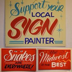 three signs on the wall that say support your local sign painter