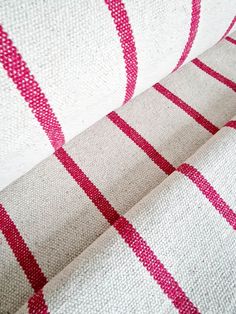 red and white striped fabric with pink stripes