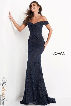 Looking for an elegant and sophisticated evening dress? Look no further than the Jovani 05059 Off the Shoulder Embellished Evening Dress. This beautiful gown features an off-the-shoulder neckline adorned with sparkling embellishments, a fitted silhouette that flatters your figure, and a sweeping train that adds a touch of glamour. Whether you're attending a black tie affair or a gala event, this dress is sure to make you look and feel like a star. Lace Evening Gowns, Jovani Dresses, Unique Prom Dresses, Glamorous Dresses, Lace Peplum, Lace Evening Dresses, Navy Lace, Pageant Dresses, Groom Dress