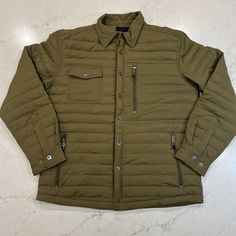 Dakota Grizzly Mens L Bruce Canteen Green Lined Jacket Zip Snap Nwot Retail $148 Excellent New Condition. No Signs Of Wear, Non Smoking Home. Please See Pictures For New Condition And Measurements. Message With Any Questions. Label Tag Cut As This Is A New Sample From Factory. I Have A Lot Of Other New Dakota Grizzly Mens Jackets, Shackets And Shirts. If You Would Like To Combine Shipping / Bundle, Feel Free To Contact Me. Thank You! * Features * Nylon Spandex Shell - Lightweight And Durable She Urban Windbreaker With Padded Collar And Long Sleeves, Urban Style Windbreaker With Padded Collar And Long Sleeves, Khaki Long-sleeve Puffer Jacket For Cold Weather, Quilted Long Sleeve Utility Outerwear, Casual Outdoor Windbreaker With Padded Collar, Quilted Long Sleeve Utility Jacket For Cold Weather, Casual Khaki Puffer Jacket For Cold Weather, Khaki Nylon Puffer Outerwear, Puffer Jacket With Padded Collar For Outdoor Activities