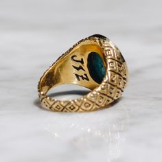 Classic style Indonesian ring in brass with an oval Chrysocolla stone. This vibrant blue ring looks great on any finger for both women and men. Chrysocolla is a copper stone that resonates with the vibrations of the Earth and helps clear blockages from the throat chakra. It promotes clear communication and the courage to express oneself. Available in Sterling Silver https://etsy.me/2kUGlpI Ring Size Available in all sizes. Please be sure to find your exact ring size for the finger you want befor Round Patina Rings For Anniversary, Heirloom Emerald Oval Signet Ring, Classic Gold Turquoise Ring With Round Shape, Oval Gold Emerald Ring With Stone Setting, Gold Oval Turquoise Ring For Anniversary, Oval Brass Promise Ring, Gold Emerald Oval Cabochon Ring, Gold Emerald Ring With Oval Cabochon, Oval Brass Rings For Anniversary