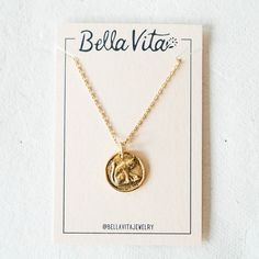 Bitty Buttons Cat Necklace Charm + Pendant Necklaces Bella Vita Jewelry Nickel Free Brass Medallion Necklace With Round Pendant, Nickel-free Brass Medallion Necklace With Round Pendant, Brass Coin Pendant Necklace For Gift, Nickel Free Brass Coin Pendant Necklace, Brass Medallion Charm Necklaces, Nickel-free Brass Coin Pendant Necklace, Brass Coin Necklace Gift, Antique Gold Coin Pendant Medallion Necklace, Brass Coin Necklace For Gift