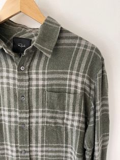 A classic cut, lightweight flannel in just the right hue. The Rails Men Lennox Old Growth Melange is the perfect addition to your wardrobe if you've been wanting to spruce up your button down section. 55% cotton : 45% rayon Full button down 1 chest pocket Lightweight Hand wash : hang dry Also available in Blue Corvair, Multi and Other Colors You've Been, Chest Pocket, Casual Button Down Shirts, Button Downs, Casual Shirts, Men Sweater, Hand Wash, Mens Shirts, Mens Outfits