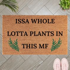 a door mat that says, i csa whole lota plants in this mf