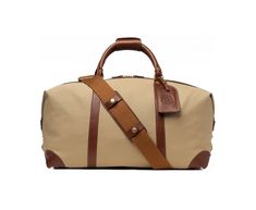 With its classically handsome looks and expandable design, the Cavalier II is your trusty partner for everything from short business trips to weekend getaways. Luxury Beige Duffle Bag, Classic Tote Travel Bag For Overnight Trips, Classic Travel Tote Bag For Overnight Trips, Classic Weekender Bag With Leather Handles For Travel, Classic Large Capacity Duffle Bag For Overnight Trips, Luxury Beige Duffle Bag With Large Capacity, Leather Travel Bags With Twill Lining, Classic Satchel Luggage For Overnight Trips, Classic Rectangular Travel Bag With Leather Handles