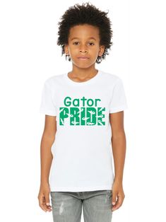 "This \"Gator Pride\" t-shirt has been designed especially for your Goodrich Gator! *Youth sizing *Three different shirt colors available *We press on Bella+Canvas jersey t-shirts. *They're very soft & preshrunk *Each shirt is made to order All items will be delivered to the school and sent home with your child.  If this is a gift, please send me a message and we can get your items to you a different way! A portion of ALL sales will be donated back directly to the Goodrich PTO!  Thank you for supporting your school!" Green Sublimation Print T-shirt For Fan Merchandise, Green Fan Apparel T-shirt For Game Day, Green T-shirt With Sublimation Print For Fans, Green Short Sleeve Shirt With Logo Print, Green T-shirt With Team Name For Game Day, Green Short Sleeve Team Spirit T-shirt, Short Sleeve T-shirt With Screen Print For Fans, Green Graphic Tee With Logo Print, Casual Green Sublimation T-shirt With Team Name