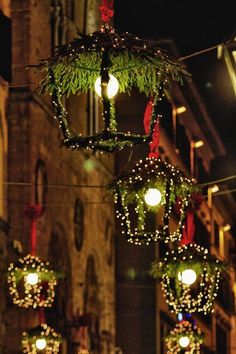 the lights are decorated with christmas decorations in arabic