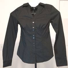 Chic Black Button Down Shirt By Maurices, The Collared Neck Adds A Touch Of Sophistication While The Fitter Cut Flatters Your Figure. Perfect For Dressing Up Or Simply Keeping It Casual. New Without Tags. Black V-neck Shirt With Buttons, Fitted V-neck Shirt With Button Closure, Button-up Cotton Top For Night Out, Cotton Button-up Top For Night Out, Fitted Office Shirt With Buttons, Fitted Office Wear Blouse With Buttons, Fitted Buttoned Tops For Work, Black V-neck Shirt For Office Wear, Fitted Button-up Blouse With Back Button Closure