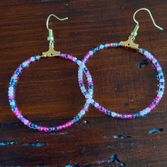 Pinks And Gray Beads On Gold Hoops Handmade Item Pink Hoop Beaded Earrings With Tiny Beads, Pink Tiny Beaded Earrings For Festival, Pink Tiny Beads Hoop Earrings, Pink Small Beads Earrings For Festival, Pink Beaded Earrings For Festival, Pink Beaded Earrings With Round Beads For Beach, Trendy Pink Beaded Earrings With Round Beads, Pink Round Beaded Earrings For Beach, Trendy Pink Hoop Earrings With Round Beads