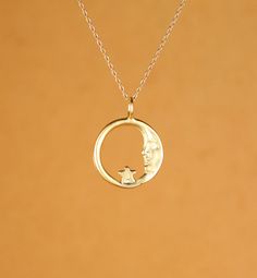 Moon necklace - sun moon and star - moon and star necklace - a gold vermeil moon and star hoop hanging on a 14k gold vermeil chain A peaceful and pretty gold vermeil moon and star charm hanging happily from a 16 inch 14k gold vermeil chain. Please feel free to select a different length chain if you prefer! The moon measures: 16mm across. More from BubuRuby? https://www.etsy.com/shop/BubuRuby?ref=hdr_shop_menu Want to see more gems? http://www.etsy.com/shop/BubuRuby?section_id=12672242 More Druzi Celestial Crescent Jewelry With Star Charm, Sterling Silver Charm Necklace With Moon And Star, Sterling Silver Star And Moon Charm Necklaces, Sterling Silver Star Charm Necklace With Moon Charm, Celestial Half Moon 14k Gold Jewelry, Celestial Crescent 14k Gold Necklace, Celestial Style 14k Gold Half Moon Jewelry, 14k Gold Crescent Celestial Necklace, Celestial Necklace With Star Charm