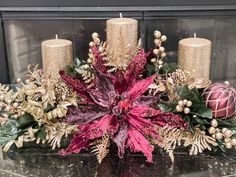 a table topped with candles and flowers on top of it